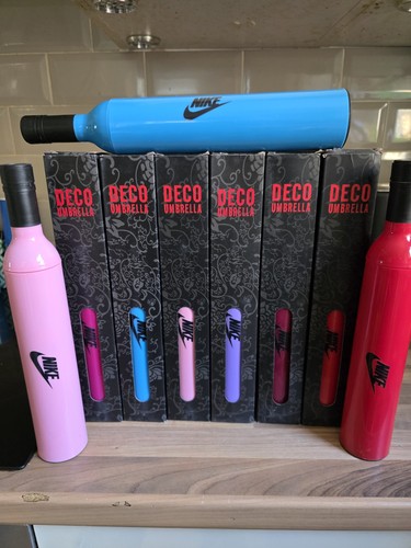 Nike umbrellas bottle in - a,