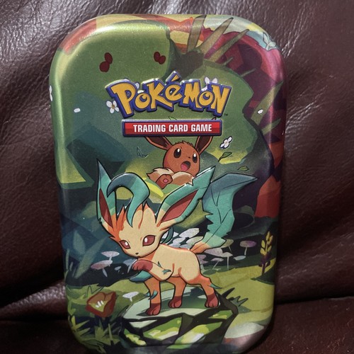 Empty pokemon tins - *empty*,