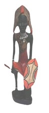 Wooden figure. ‘’Kneeling