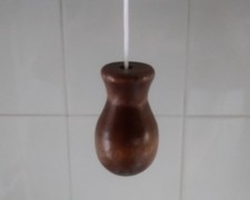 dark wooden pull switch handle