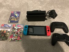 Nintendo Switch Bundle + Pro Controllers & 3 Games – Good Condition