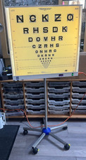4  interchangeable logarithmic visual acuity charts with light box stand screen