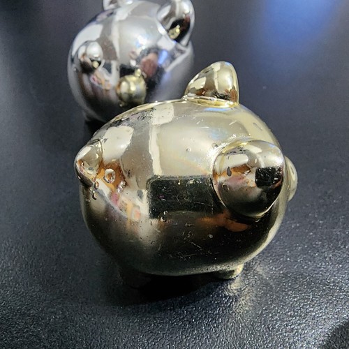 Pair small chrome resin pig - pair,