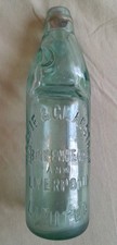 vintage mackie & gladstone green Glass Bottle With Glass Marble Inside 