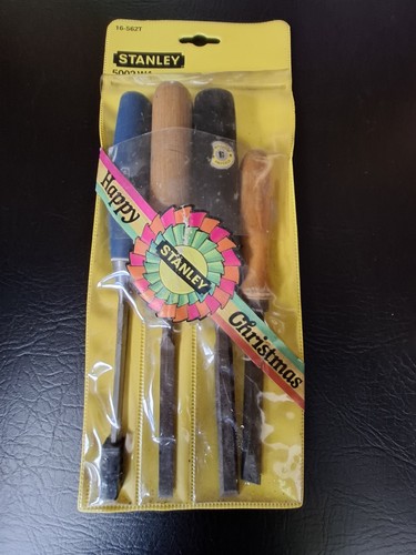 Four random wood chisels - four,
