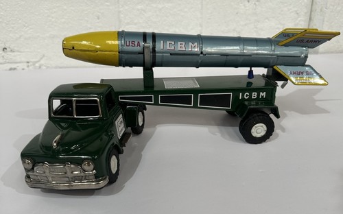 Vintage tin toy icbm - tin, carrier
