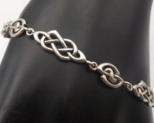 Vintage sterling silver bracelet oval and round Celtic knot  links by Kit Heath