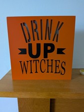 Drink Up Witches. Orange wooden sign.  Battery operated.