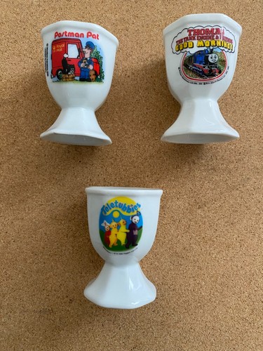 Three egg cups - three, of