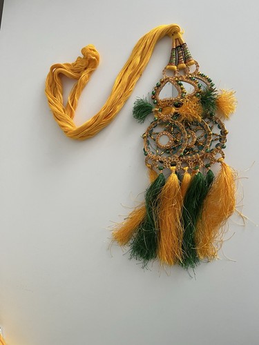 Yellow and green paranda with - yellow,
