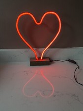 Neon style red plug in heart