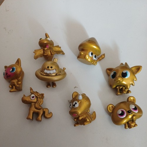 Gold moshi monster figures - 8,