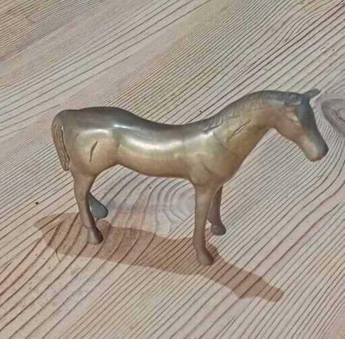 Brass figure a standing - figure, of