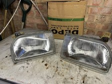 FORD ESCORT MK4 GENUINE HEADLAMPS
