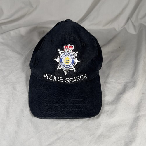 Police search baseball cap - police,