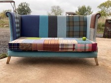 A FINE CONTEMPORARY PATCHWORK SOFA IN THE ANTIQUE MANNER