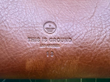 This is Ground. brown leather  lap top case. personal office  36cm x 27cm