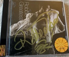 Robbie williams signed twice - williams,