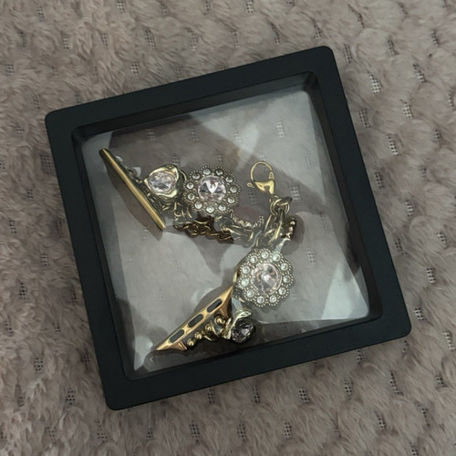Gold tone charm - tone, watch