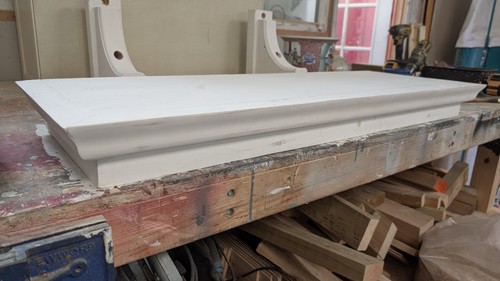 Front door pine canopy ledge - front,