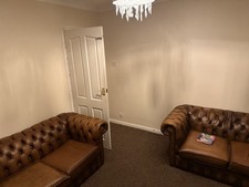 Vintage Brown Leather Chesterfield Two-seater Sofa Two Available