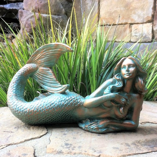 Mermaid statue laying down - laying,