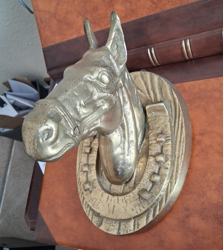 Large brass horse head and