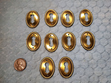 Oval Keyhole Escutcheons Brass