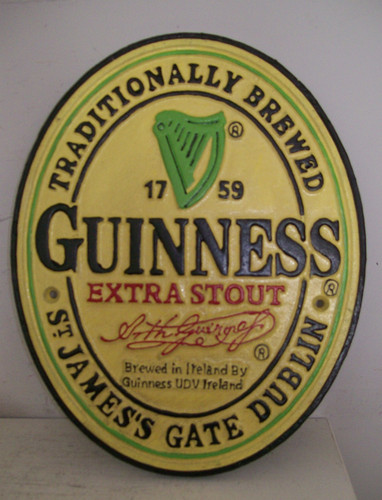 Large cast iron guinness - cast,