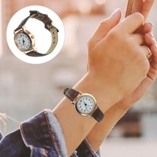 Woman Watches Small Face