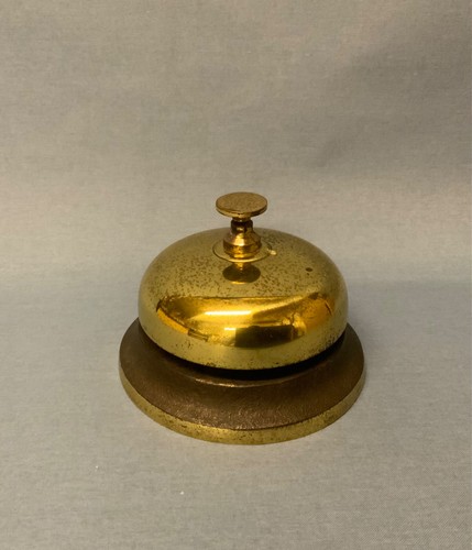 Vintage brass push button