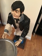 Blue swade shoes Waiter statue , Elvis style.