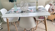 White table and four chairs - and,