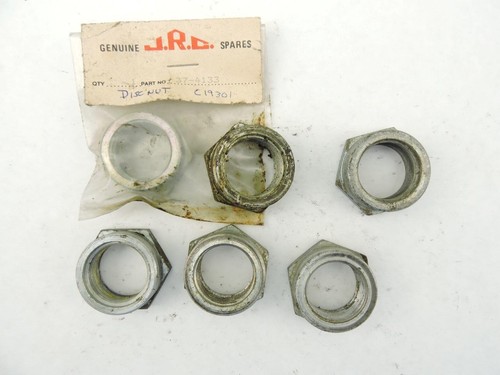 Front wheel axle nuts - front,