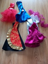 Barbie doll clothes / dresses x 4