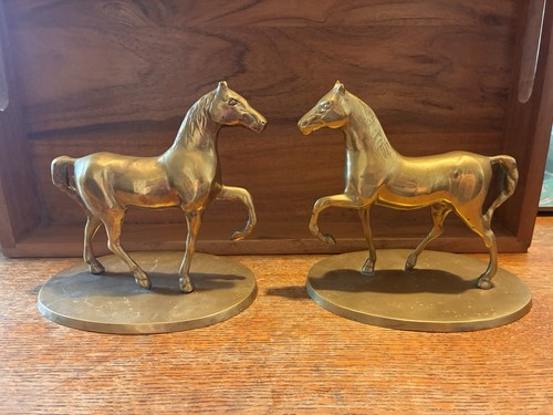 Brass prancing trotting horses - prancing,