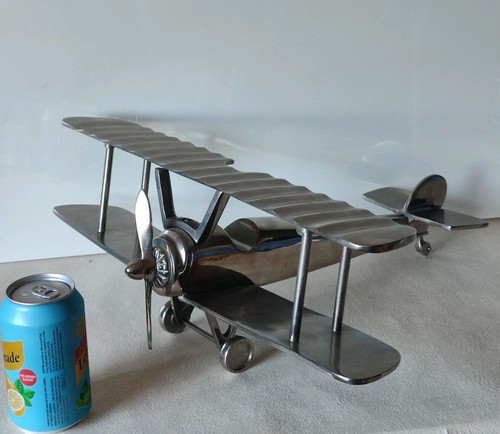 Large solid metal - solid, biplane