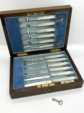 Boxed 12 piece sterling silver & mother of pearl tea knife & fork cutlery set