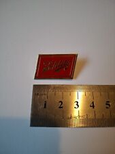 Vintage United States Schlitz Beer gold tone & enamel Pin Badge Advertising