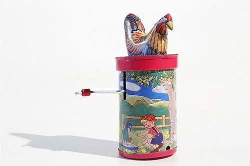 Clucking rooster tin toy - clucking,
