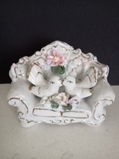 Love Seat With Two White Doves Sitting