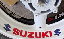 8 x Suzuki  wheel stickers 7- 9 year quality vinyl , any colours  shaped to fit.