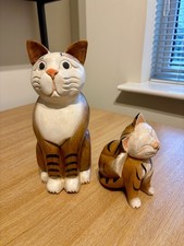Pair of wooden cats