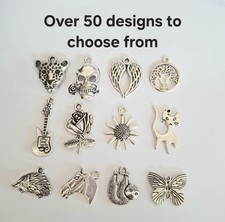 10 Tibetan Silver Charms -
