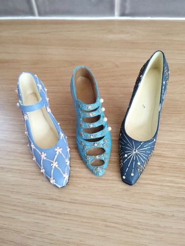 Three beautiful miniature shoe - three,