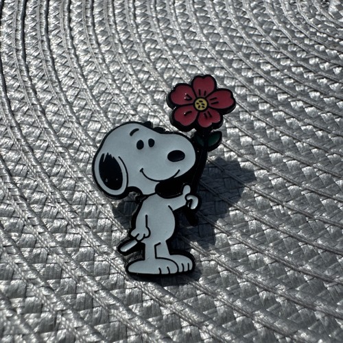 Snoopy with his - with, flower