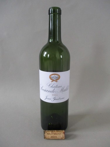 Used empty red - wine, bottle
