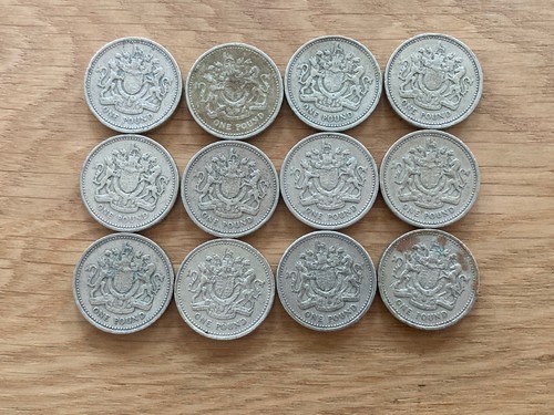 Royal arms round one pound - round,