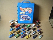 Mattel/Hot Wheels "CARRY CASE 1998, WITH 24 VEHICLES" + 6 other diecast models.
