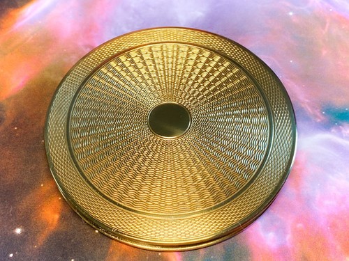 Engine turned art deco gold